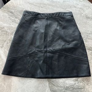 Black Zara A-line faux leather skirt - women’s size M with pockets